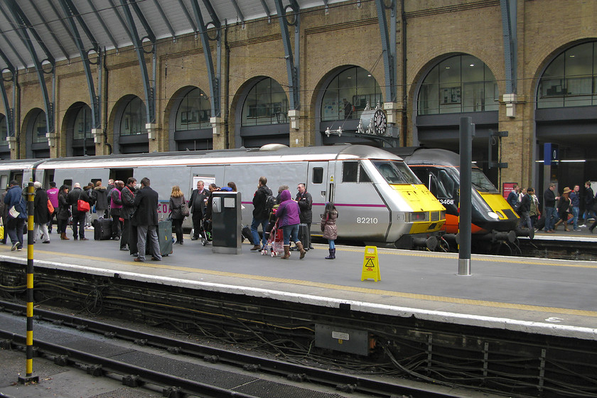 82210, GR 13.00 London King`s Cross-Edinburgh (1S18) & 43468, GC 12.53 London King`s Cross-Sunderland (1N93), London King`s Cross station 
 A busy scene at King's Cross' platform ends as passengers make their way down number two to board the 13.00 to Edinburgh with DVT 82210 at the rear. Next to it, Grand Central's HST, with power car 43468 at the rear, will already be boarded as it will soon be leaving as the 12.53 to Sunderland. The passengers next to the HST will be disembarking from an up service that will have just have terminated at platform 0. 
 Keywords: 82210 13.00 London King`s Cross-Edinburgh 1S18 43468 12.53 London King`s Cross-Sunderland 1N93 London King`s Cross station