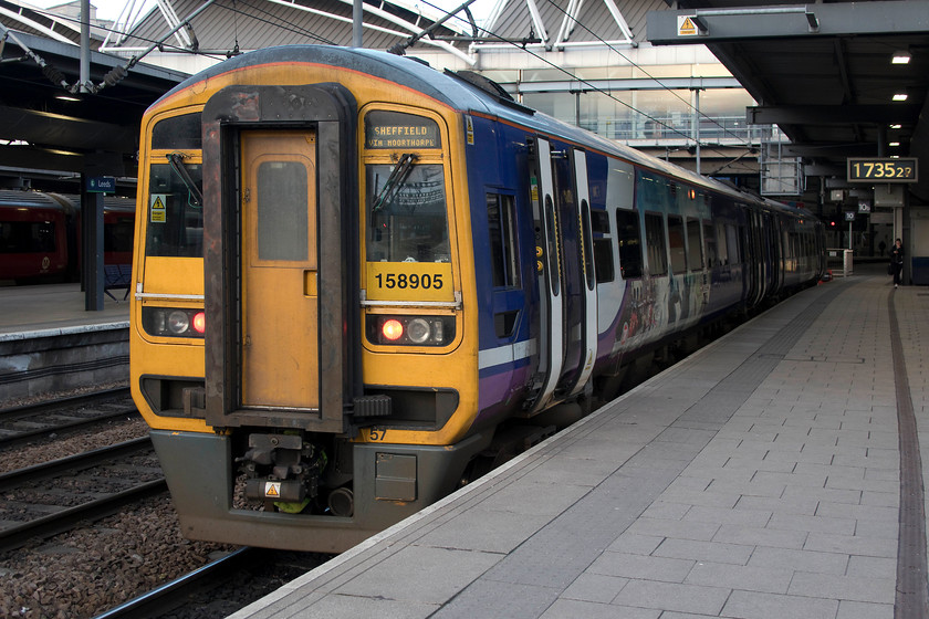 158905, NT 16.15 Sheffiled-Leeds (2N23, 2L), Leeds station 
 158905 has arrived at Leeds station with the 16.15 from Sheffield. It will then sit in the south facing bay platform 10A until it returns as the 17.48 departure. Notice that the crew have already set the destination screen and the headlights ready for its return. 
 Keywords: 158905 16.15 Sheffiled-Leeds 2N23 Leeds station