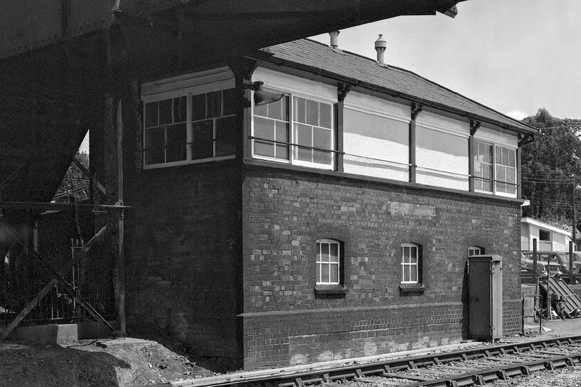 St. Austell signal box (closed) (GWR, 1906) 
 St. Austel signal box is a 1906 GWR Type 7C structure dating from 1906. When I took this photograph in 1981 it had been closed for a year thus creating a block section between Par and Burngullow. Interestingly, by pure chance during my last visit to the area in 2017 I stood in what was a very similar spot to take a photograph replicating this one, see.... https://www.ontheupfast.com/p/21936chg/24717826404/st-austell-signal-box 
 Keywords: St. Austell signal box GWR, 1906