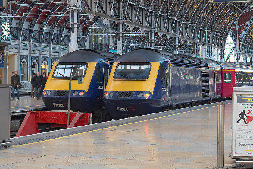 43003, GW 13.00 Bristol Temple Meads-London Paddington (1A18) & 43158, GW 11.24 Swansea-London Paddington (1L55), London Paddington station 
 With platforms one and two out of use due to engineering work, the rest of Paddington's platforms were under a bit of pressure. Here, 43003 (ex 253002) has just terminated with the 13.00 from Bristol Temple Meads. Meanwhile, 43158 arrived earlier with the 11.24 from Swansea. This scene, HSTs side by side at Paddington, is something familiar to all of us for four decades but it is something that will change dramatically over the coming couple of years. 
 Keywords: 43003 13.00 Bristol Temple Meads-London Paddington 1A18 43158 11.24 Swansea-London Paddington 1L55 London Paddington station