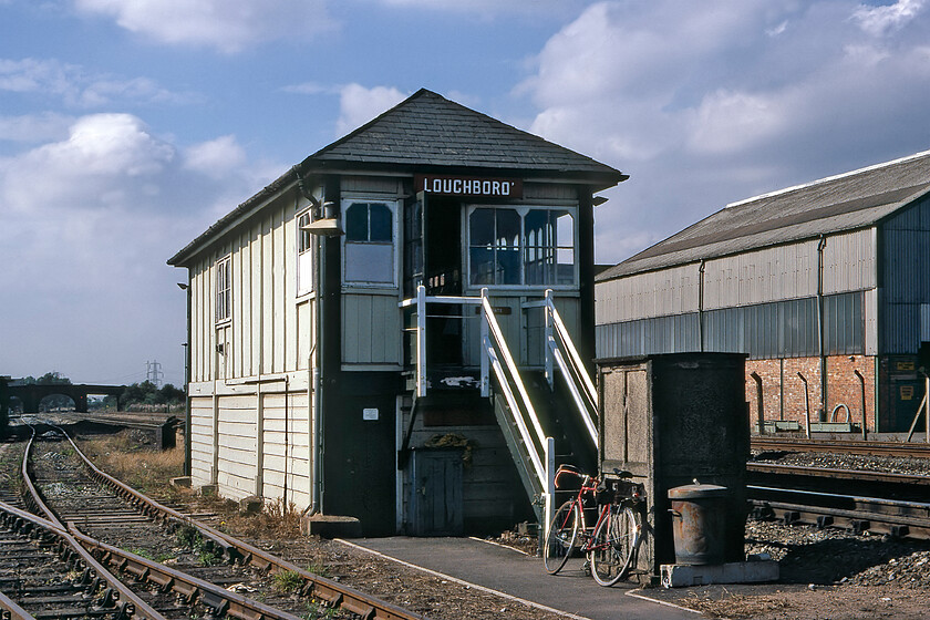 Loughborough signal box (MR, 1892) 
 I can find precious little out about Loughborough signal box. It was located just to the north of the station and I believe that this was its original full name prior to the closure of the South box. Notice the signalman's period bike leaning against the bottom of the steps. I suspect that the box closed along with others on this section of the MML in 1987. 
 Keywords: Loughborough signal box Midland Railway