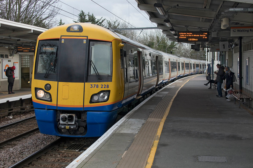 378228, LO 13.15 Stratford-Richmond (2N72, RT), Gospel Oak station 
 London Overground's 378228 arrives at Gospel Oak station with the 13.15 Stratford to Richmond train. We took this service to West Hampstead, a journey of about fifteen minutes. I think that the interior of these older 378 units is superior to the much newer Class 710s. They are certainly impressive when viewed inside from front to rear on a straight section of track looking down the entire length of the train! 
 Keywords: 378228 13.15 Stratford-Richmond 2N72 Gospel Oak station