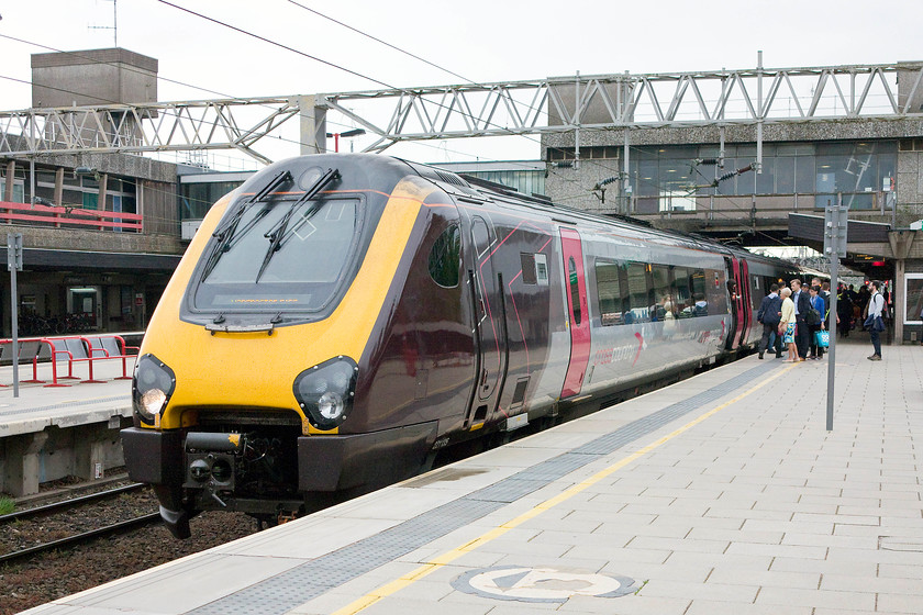 221135, XC 07.31 Birmingham New Street-Manchester-Piccadilly (1H17, RT), Stafford station 
 221135 pauses at Stafford working the 07.31 Birmingham New Street to Manchester Piccadilly. This is a relatively short Cross Country working that travels under the wires for the whole of its 81 mile journey, I have to question the merits of running a diesel unit on this working? 
 Keywords: 221135 1H17 Stafford station