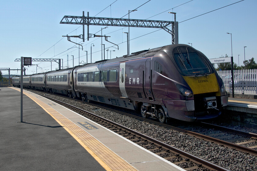 222005, EM 10.30 London St. Pancras-Sheffield (1F27, 17L), Wellingborough station 
 Hot on the heels of a slow stopper and travelling at a much-reduced speed 222005 passes through Wellingborough station working the 10.30 St. Pancras to Sheffield. Until this point in its journey, the 1F27 was running to time but being pathed behind the stopper proved to be the catalyst that delayed the train for the rest of its journey arriving at its destination seventeen minutes adrift. 
 Keywords: 222005 10.30 London St. Pancras-Sheffield 1F27 Wellingborough station EMR East Midlands Railway Meridian