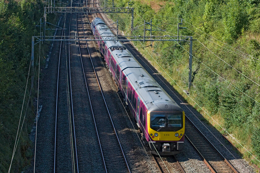 360105 & 57303, 13.08 Kettering Stabling Sidings-Northampton EMD (5B60, 77L), Hyde Road bridge 
 EMR's 360105 is seen entering Roade cutting dragged by 57303 (formally 57705 & 'Pride of Carlisle'). The Desoro is being dragged from its usual haunts on the MML to Northampton's Siemens depot as 5B60, with a locomotive run round at Bletchley. The unit will spend a week or so at the facility having servicing and an exam. undertaken before returning whence it came. 
 Keywords: 360105 57303 13.08 Kettering Stabling Sidings-Northampton EMD 5B60 Hyde Road bridge