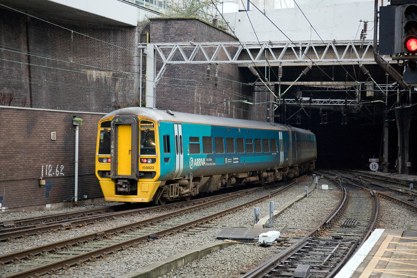 158822, AW 11.30 Aberystwyth & Pwllheli-Birmingham International (1G35), Birmingham New Street station 
 158822 laves Birmingham New Street station entering New Street South tunnel embarking on the final stretch of its journey as the 11.30 from Aberystwyth and Pwllheli to Birmingham International. Although it cannot be seen in this image, this train is composed of two units that come together at Machynlleth to work forward. This must be a fascinating journey to make by train and one that I have on my 'must do' list. 
 Keywords: 158822 11.30 Aberystwyth Pwllheli-Birmingham International 1G35 Birmingham New Street station