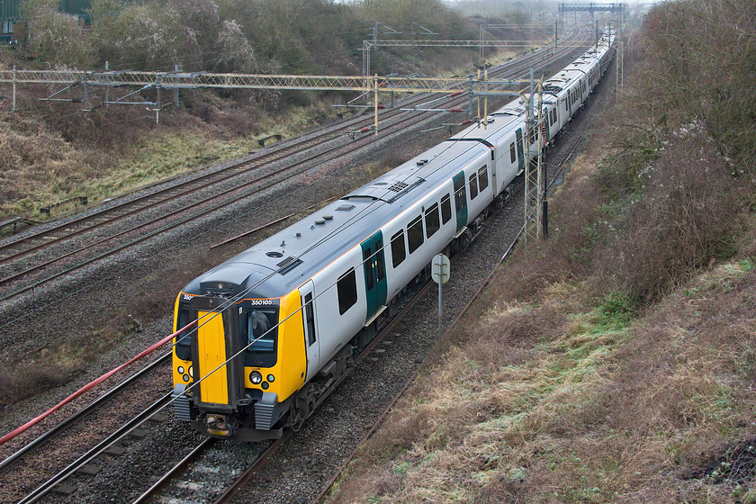 350105, 350130 & 350111, LN 11.25 Northampton-London Euston (2N22, RT), Victoria bridge 
 A three-set Desiro heads south past Victoria bridge working the 11.25 Northampton to Euston formed by 350105, 350130 and 350111. On any normal New Year's Eve, I would be commenting about the train being full of revellers heading for London to celebrate on the Thames embankment with the chimes of Big Ben ringing out at midnight but not this year. With nearly the whole country in Tier Four restrictions, the populous will be celebrating the end of 2020 at home. 
 Keywords: 350105 350130 350111 11.25 Northampton-London Euston 2N22 Victoria bridge London Northwestern Desiro