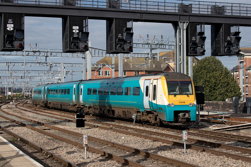 175116, AW 07.50 Fishguard Harbour-Manchester Piccadilly (1W56, 1L), Cardiff Central station 
 Still wearing its Arriva Trains Wales livery but devoid of any branding, 175116 arrives at a sunny Cardiff Central forming the 07.50 Fishguard Harbour to Manchester Piccadilly. Notice that the electrification masts and gantries are in place to the western end of Cardiff station with the wiring yet to be strung. 
 Keywords: 175116 07.50 Fishguard Harbour-Manchester Piccadilly 1W56 Cardiff Central station