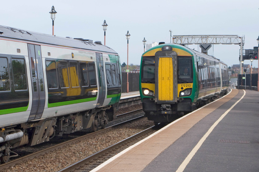 172339, LM 15.55 Kidderminster-Dorridge (2C56) & 172213, LM 16.19 Whitlocks End-Worcester Foregate Street (2V42), Birmingham Moor Street station 
 The class 172s have completely taken over the cross-Birmingham services over the last five years replacing the elderly and unpopular class 150s. To the left at Birmingham Moor Street, 172339 leaves with the 15.55 Kidderminster to Dorridge. Meanwhile, to the right, 172213 slows for its stop working the 16.19 Whitlocks End to Worcester Foregate Street. 
 Keywords: 172339 15.55 Kidderminster-Dorridge 2C56 172213 16.19 Whitlocks End-Worcester Foregate Street 2V42 Birmingham Moor Street station London Midland Railway