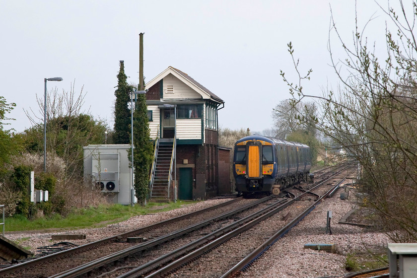 375620, SE 13.10 London Charing Cross-Ramsgate (2R38, 13L), Minster Station 
 375620 passes the Southern's 1929 built signal box forming the 13.10 from Charing Cross to Ramsgate. Minster station once boasted 3 platforms, substantial buildings and full length canopies. All of that has now gone and I can imagine that in winter it's a pretty desolate place! 
 Keywords: 375620 2R38 Minster Station