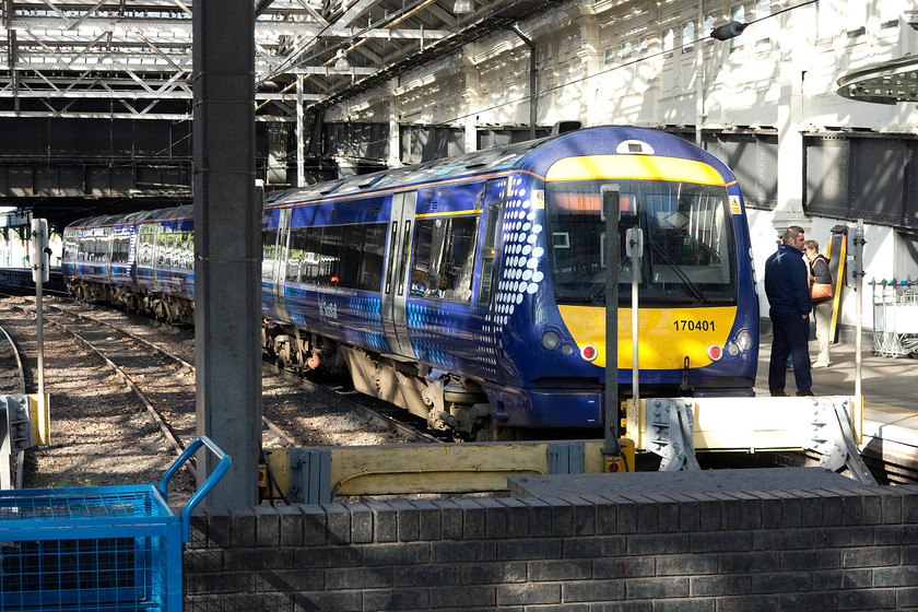 170401, SR 09.49 Edinburgh Waverley-Glenrothes with Thornton (2G49), Edinburgh Waverley station 
 Whilst most of Edinburgh Waverley station is 'open' allowing access to most platforms, the east facing bays have a gate line meaning I did not get on to them, I do not like having to ask so rarely do! From the gate line, 170401 is about to leave working the 09.49 to Glenrothes with Thornton 
 Keywords: 170401 09.49 Edinburgh Waverley-Glenrothes with Thornton 2G49 Edinburgh Waverley station.