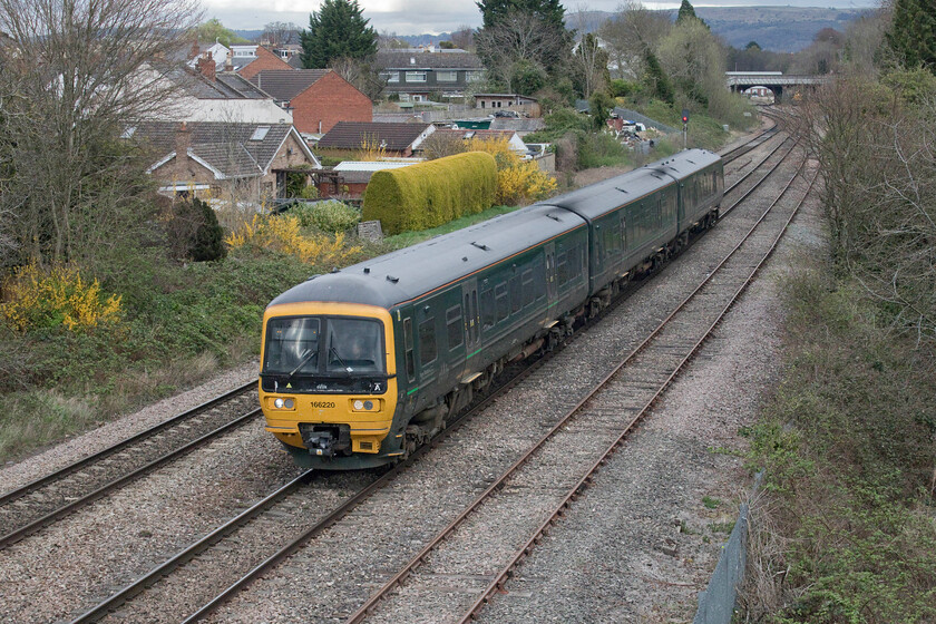 166220, GW 16.43 Great Malvern-Westbury (2C28, RT), Cloddy bridge 
 GWR's 166220 leaves Cheltenham passing Cloddy bridge working the 2C28 16.43 Great Malvern to Westbury service. After all my years of railway photography this appears to be my first image of this particular Turbo unit; quite how it has eluded my lens for so many years remains a mystery! 
 Keywords: 166220 16.43 Great Malvern-Westbury 2C28 Cloddy bridge GWR Great Western Railway Turbo