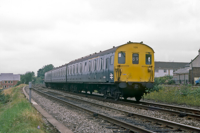 1125, ECS working, Salisbury West 
 In what appeared to be an empty coaching stock move Thumper 1125 returns towards Salisbury station after crossing over from the down to the up line. I always had a great fondness for these DEMU's that were a class on their own in terms of the noise they made. Having spent a time working the Portsmouth Harbour to Bristol Temple Meads route they were now confined further south working locals between Salisbury, Reading, Portsmouth and Southampton. 
 Keywords: 1125 ECS working Salisbury West Class 205 Thumper