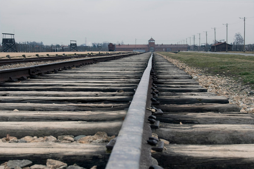 Auschwitz II-Birkenau 1 
 I am not sure if this is the actual track that carried the tens of thousands of wagons containing the oppressed people of Europe into the death camps or if they have been re-laid subsequent to the liberation in 1945? Either way, they are a poignant feature of the photograph leading one's eye towards probably the building so synonymous with the death camp at Auschwitz II. 
 Keywords: Auschwitz II-Birkenau 1