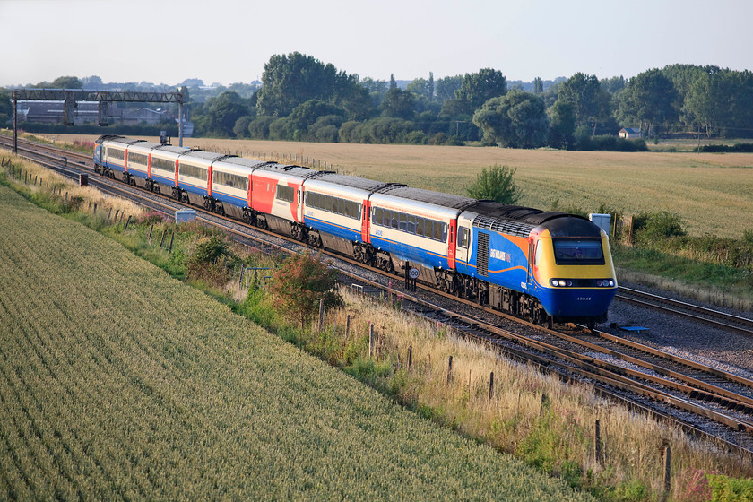 43045 & 43076, EM 18.32 Nottingham-London St. Pancras (1B73, 1L), Harrowden Junction 
 EMT 43045 and 43076 cross Harrowden Junction on the northern approach to Wellingborough working the 18.32 Nottingham to St. Pancras. Notice the set is uniform apart from the rogue Virgin East Coast buffet. 
 Keywords: 43045 43076 1B73 Harrowden Junction