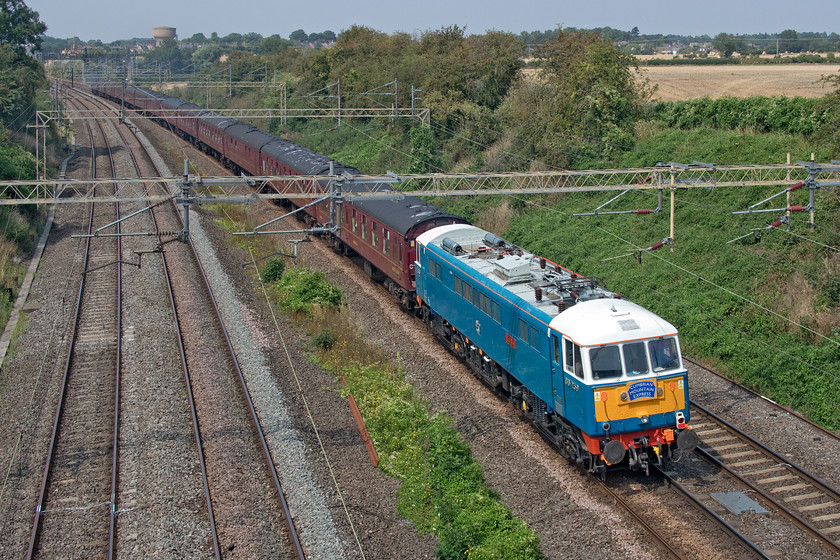 86259 (DIT), 12.23 London Euston-Chester ECS (5Z89, RT), Victoria bridge 
 Still wearing its headboard from yesterday's charter train 86259 'Les Ross/Peter Pan' is dragged at the rear of the 12.23 Euston to Chester 5Z89 empty stock move. Whilst the veteran Class 86 is usually stabled at Rugby there was no time in its path for the train to stop and for it to be detached. I am not sure but I think that it was removed at Crewe as ten minutes was taken there according to RTT. The train then continued through to Chester to be stabled there until operating 'The Dalesman' charter the following Tuesday. 
 Keywords: 86259 DIT 12.23 London Euston-Chester ECS 5Z89 Victoria bridge Less Ross Peter Pan