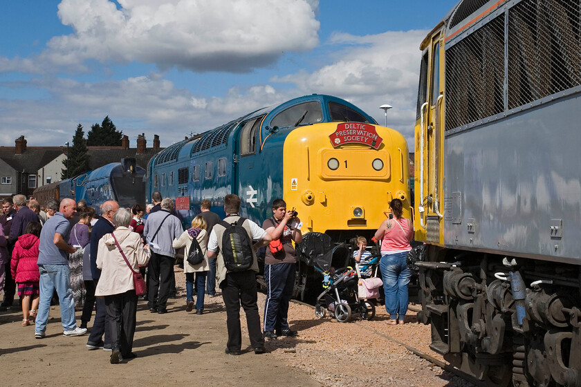 4468, 55019 & 56311, on display, Mallard 75 celebrations, Grantham Yard 
 The full line-up of locomotives at the Mallard 75 celebration are seen in the small yard adjacent to Grantham station. Whilst Deltic 55019 'Royal Highland Fusilier' has a historical right to be there along with the star of the show 4468 'Mallard' I am not sure about 56611 to the extreme right. 
 Keywords: 4468 55019 56311 Mallard 75 celebrations Grantham Yard Mallard Royal Highland Fusilier