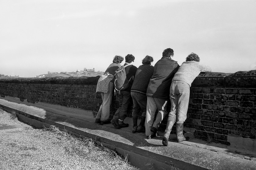 Pat, Mum, Dad, Les & Jeanette, Larpool viaduct 
 Not the most flattering of family photographs but an interesting one nonetheless! From left to right it shows my aunty Pat, mum, dad, uncle Leslie and my cousin Jeanette. They are all taking in the superb vista from high above the River Esk on the thirteen arch Larpool viaduct. The superb structure that dominates the Esk valley immediately south of Whitby was opened in October 1884 by the Scarborough and Whitby Railway that rang along the dramatic coastline between the two towns. It closed in 1965 but the viaduct remained and gained listed status in 1970. Today it remains very popular with walkers and cyclists forming part of the Scarborough to Whitby Rail Trail and is also part Scarborough to Whitby Cinder Track cycle route. 
 Keywords: Larpool viaduct