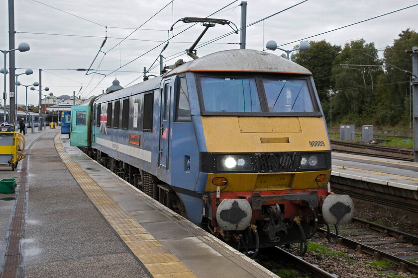 90009, LE 11.00 Norwich-London Liverpool Street, Norwich station 
 Celebrity named and suitably adorned 90009 'Diamond Jubilee' waits at Norwich station to work the 11.00 service to London Liverpool Street. Greater Anglia named this locomotive last year (May 2012) to commemorate the anniversary of Queen Elizabeth II's accession to the throne on February 6, 1952. 
 Keywords: 90009 11.00 Norwich-London Liverpool Street Norwich station Greater Anglia NX Diamond Jubilee