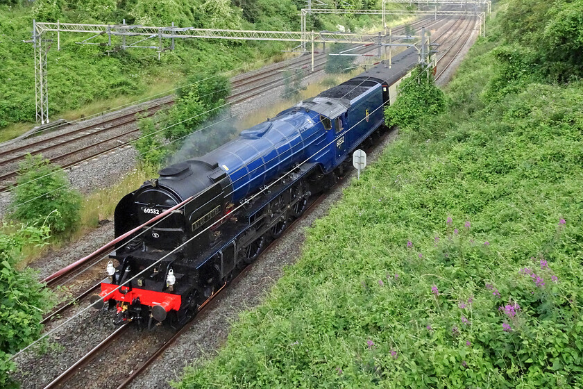 60532, 07.16 Crewe HS-Southall LSL (5Z30, 37L), Victoria bridge 
 60532 'Blue Peter' is the only example of an LNER Peppercorn Class A2 with the other fourteen all scrapped. It has been away from our railways for many years whilst undergoing a complete rebuild but it is now back and looking superb! It is seen passing Victoria bridge just south of Roade with a support coach as the 5Z30 07.16 Crewe HS to Southall LSL. The following day it was to work a demonstration train to York organised and operated by LSL. 
 Keywords: 60532 07.16 Crewe HS-Southall LSL 5Z30 Victoria bridge Blue Peter LNER Peppercorn Class A2