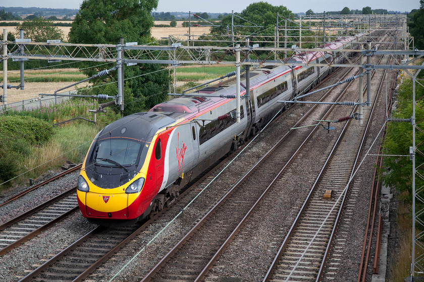 390047, VT 06.45 Wolverhampton-London Euston (1B04, 2E), Hungate End SP784465 
 Having left Wolverhampton almost exactly an hour earlier, 390047 passes Hungate End near Hanslope Junction with the 06.45 to London Euston. 
 Keywords: 390047 1B04 Hungate End SP784465