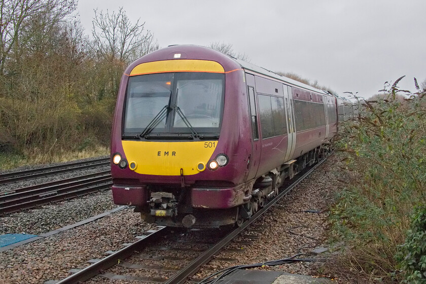 170501, EM 08.24 Nottingham-Leicester (2L14, RT), Syston station 
 In horrible weather, EMR's 170501 arrives at Syston's single platform station working the 08.24 Nottingham to Leicester local service. On days such as this, the normals do tend to look at us out with our cameras looking a trains in an odd manner; mind you that tends to happen even when the weather is better! 
 Keywords: 170501 08.24 Nottingham-Leicester 2L14 Syston station EMR Turbostar