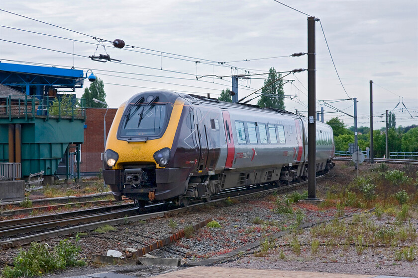 221124, XC 13.00 Glasgow Central-Plymouth (1V66), York station 
 With the National Railway Museum just putting in an appearance to the top left of this photograph 221124 arrives at the station working the 13.00 Glasgow Central to Plymouth CrossCountry service. The unchecked growth to the north of the station in this view is a little disappointing with Network Rail not appearing to do anything about it? 
 Keywords: 221124 13.00 Glasgow Central-Plymouth 1V66 York station CrossCountry Voyager