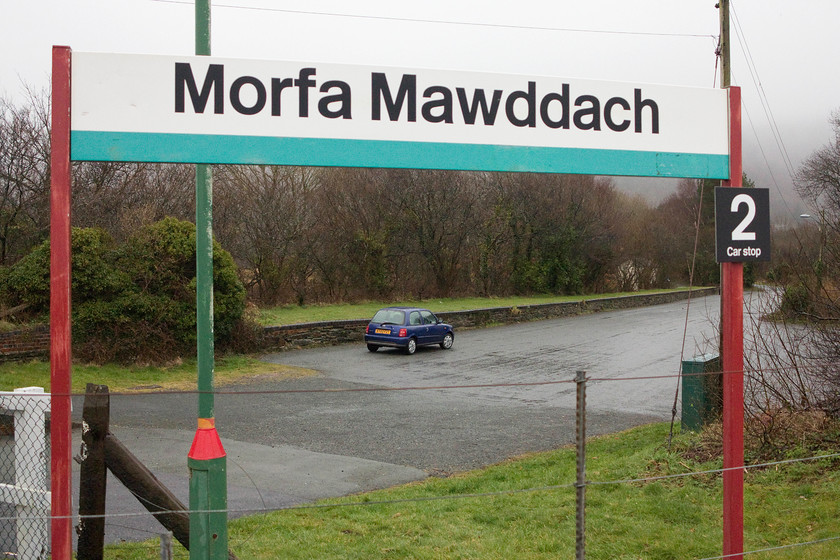 KY52ZFT & old platform, Morfa Mawddach station 
 "The Nissan Micra standing at platform three is the 16.30 to Bala Junction" so could be the announcement at Morfa Mawddach station. This once very busy and important station, originally called Barmouth Junction, now has just one platform and no facilities. The Micra is sitting on the course of the trackbed with the redundant platform clearly in situ. Trains from this platform headed up to Bala Junction and then onwards to Wrexham (via the now Llangollen Railway) or to Denbigh and the North Wales coast 
 Keywords: Morfa Mawddach station