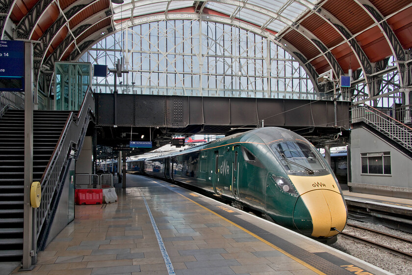 802017, GW 12.02 Oxford-London Paddington (1P24, 4L), London Paddington station 
 In a very hot Paddington station, 802017 is seen arriving at platform one with the 1P24 12.02 GWR service from Oxford. It was a scorching day in London (and in many other places too) but there appeared to be very few issues with the railways appearing to be coping well with the conditions. 
 Keywords: 802017 12.02 Oxford-London Paddington 1P24 London Paddington station GWR IET