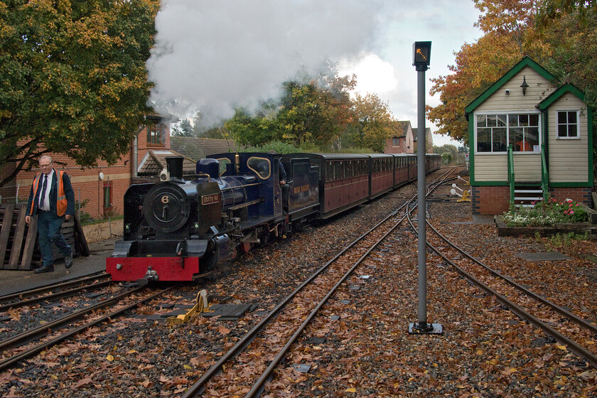 6, ECS, Aylsham (Bure Valley Railway) station 
 Having revered out of Aylsham's Bure Valley Railway station number 6 'Blickling Hall' draws the stock back into the station ready to work the final train of the day. Unusually for a heritage line, the BVR does not use mechanical signalling to control its trains despite the attractive signal box seen here. It actually uses a radio-controlled token system for the single line and this is operated from here. 
 Keywords: 6 ECS Aylsham Bure Valley Railway station Blickling Hall