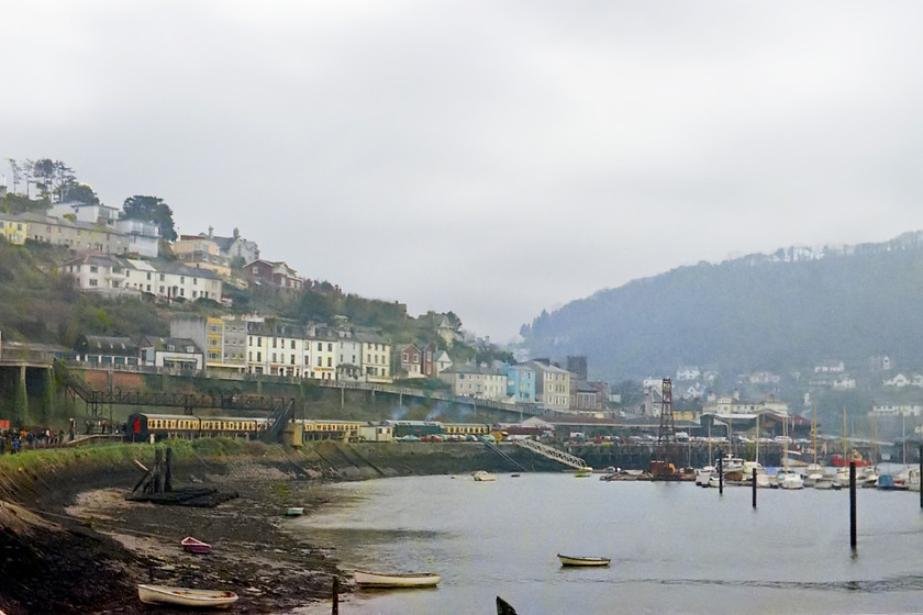 D1013 & D1062, running round, Kingswear station 
 Having arrived at Kingswear on the train in the distance, I sprinted to the position that I am in in order to capture the final working of the day. In a view looking back towards the station D1013 'Western Ranger' and D1062 'Western Courier' are seen running round with a distinct trail of smoke from D1013's Maybach engines. 
 Keywords: D1013 D1062 running round Kingswear station