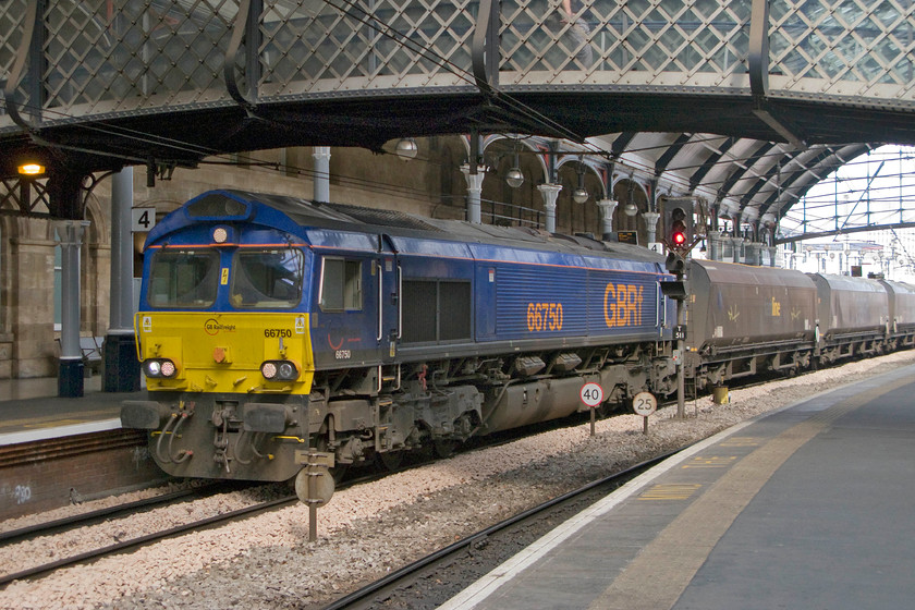 66750, 13.53 North Blyth-West Burton power station (6B39), Newcastle station 
 I must admit that this working caught me by surprise, hence the poor framing of the train. However, as 66750 is a photographic cop I am including the image. The 66 leads the 13.53 North Blyth to West Burton power station train loaded with imported coal. The train will end up at the West Burton facility between Gainsborough and Retford with the coal fueling the 'B' station as opposed to the 'A' station that is gas-fired. 
 Keywords: 66750 13.53 North Blyth-West Burton power station 6B39 Newcastle station coal train