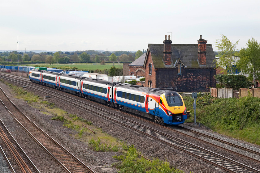 222016, EM 09.26 London St. Pancras-Sheffield (1F17, 1E), Oakley TL013539 
 222016 is seen passing Oakley just north of Bedford on the MML forming the 09.26 London St. Pancras to Sheffield. The picture is taken with the help of a ladder as Network Rail have installed a huge number of replacement bridges as part of the forthcoming electrification that have absurdly high parapets. Behind the train is the former Oakley station building, opened by the Midland Railway in 1857 and closed by British Railways in 1958. 
 Keywords: 222016 1F17 Oakley TL013539