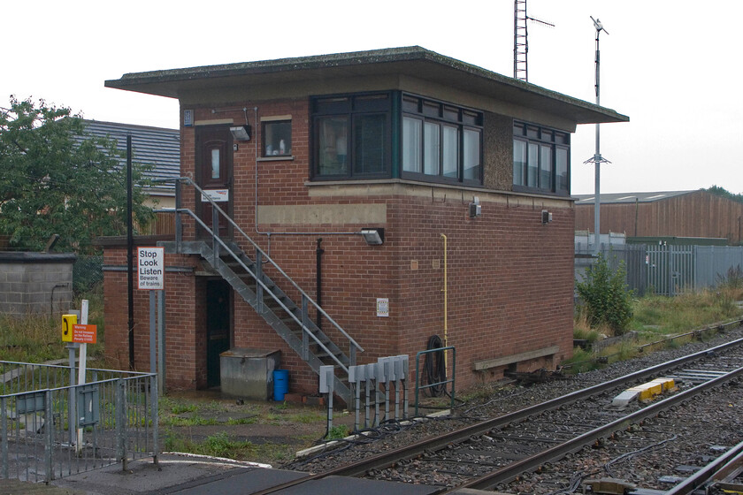 Gillingham signal box (BR, 1957) 
 The austere and functional signal box at Gillingham (Dorset) is seen from the platform end. The box was built by British Railways in 1957 replacing a L&SWR structure. I must have stood in a nearly identical position back in 1981 when I visited the station as a schoolboy, see.... https://www.ontheupfast.com/p/21936chg/30033391730/gillingham-signal-box-br-1957 
 Keywords: Gillingham signal box BR 1957 British Railways