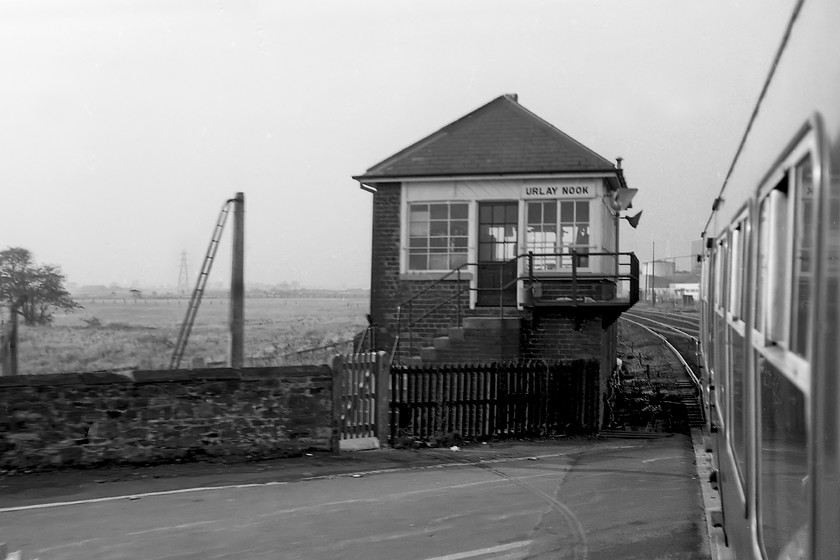 Urlay Nook signal box (NER, E.1896) 
 Unfortunately, the delightfully named Urlay Nook signal box has only recently (as of 2020) been decommissioned and the box promptly demolished. I really hope that we do not rue the day that these old and historically interesting structures are simply disposed of after completing over a hundred years of service to our public transport network. This box was located on the line to Darlington just west of Eaglescliffe. Until its closure, the box operated one of the very last examples of the very odd electrical wheel boom level crossing gates as seen at Cutsyke back in 2018, see..... https://www.ontheupfast.com/p/21936chg/23791611404/cutsyke-signal-box Notice the arced marks on the road surface of the crossing that are made by the directly powered wheels that carried the gates. These delightfully anachronistic pieces of infrastructure were replaced by rather dull lifting barriers when the box was closed in 2019. Luckily, Andy and I managed a visit to the box prior to its closure in 2014, see.... https://www.ontheupfast.com/p/21936chg/30018035737/x38-urlay-nook-signal-box-ne-1896 
 Keywords: Urlay Nook Signal Box Urlay Nook signal box