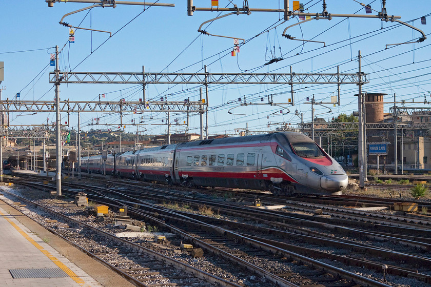 600.004, unidentified working, Florence SMN station 
 A Pendolino (Italian style) 600.004 leaves Florence SMN with an unidentified working. These Alston built 174 Mph tilting trains were introduced in 2008 and look very impressive with their very long aerodynamic nose cones. 
 Keywords: 600.004 Florence SMN station