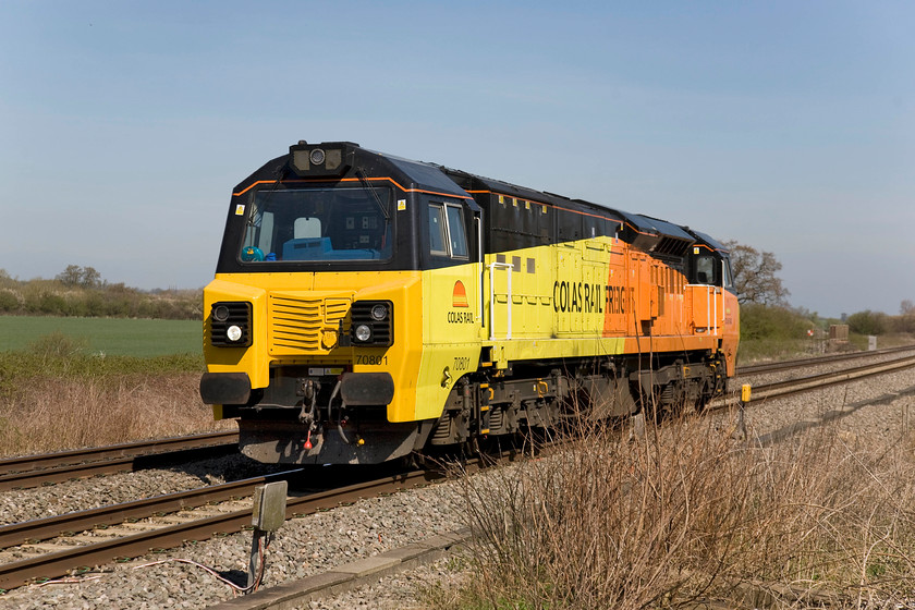 70801, 11.51 Hinksey-Westbury (0F17), Knighton crossing SU276890 
 Light engine moves are not the most photogenic but when it's a Colas liveried class 70 in weather such as this, it becomes a different proposition! 70801 travels along the GWML at Knighton on the Wiltshire and Oxfordshire border as the 11.51 Oxford Hinksey Yard to Westbury. This locomotive will travel through Swindon to Chippenham then taking the Melksham route to Westbury at Thingley Junction. 
 Keywords: 70801 11.51 Hinksey-Westbury 0F17 Knighton crossing SU276890