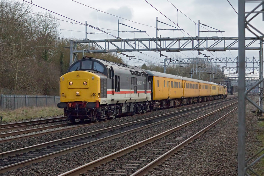 37254, 10.43 Woking-Derby RTC (1Z65, 45E), Bradwell SP831391 
 This is the one that nearly got away! As I parked the car I thought that I would check on Real Time Trains as to the progress of this 1Z65 test train. I was shocked to see that it was already approaching Milton Keynes Central so I had a short sprint to this spot at Bradwell to get the shot! So, apologies for the poor composition but I had no time to set the picture up properly. However, a reasonable record shot has been produced showing InterCity liveried 37254 leading the 10.43 Woking to Derby RTC working some 45 minutes early at this point. 
 Keywords: 37254 10.43 Woking-Derby RTC 1Z65 Bradwell SP831391