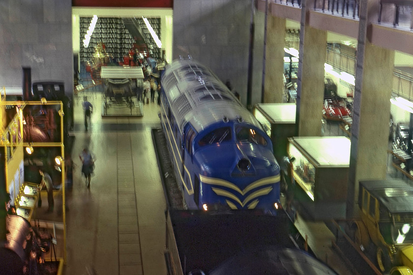 DP1, on-display, Science Museum 
 Unfortunately, a bit of motion blur has spoilt this picture taken inside the Science Museum in Kensington. It shows the prototype Deltic DP1 resplendent in its as-built fluorescent blue livery with speed whiskers. It was constructed in 1955 by English Electric at the Dick, Kerr & Co Works in Preston. Initially, it saw use on the WCML but latterly on the ECML. It was these trials that eventually led to the order for the twenty-two production Deltics. DP1 was retired in early 1961 when it was donated to the Science Museum, then passing to NRM at York and then Shildon. 
 Keywords: DP1 Science Museum