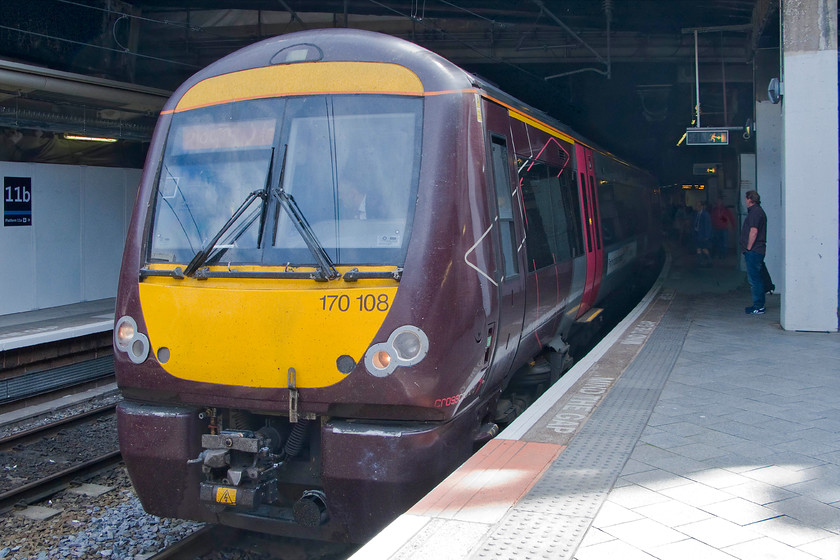 170108, XC 10.10 Nottingham-Cardiff Central (1V07), Birmingham New Street station 
 Not an ideal or my preferred way to get from Birmingham to Cardiff but 170108 would have to do! The 10.10 Nottingham to Cardiff Central arrives into Birmingham New Street's platform twelve. These units have comfortable seats and plenty of room but the ride is not great and, depending upon where you sit they are noisy. 
 Keywords: 170108 10.10 Nottingham-Cardiff Central 1V07 Birmingham New Street station Cross Country