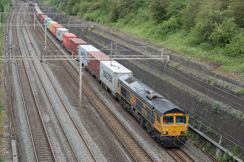 66702, 14.18 Trafford Park-Felixstowe North (4L18, 11E), Roade cutting 
 Freight two.....

66702 'Blue Lightning', 4L18 14.18 Trafford Park to Felixstowe North through Roade cutting. 
 Keywords: 66702 14.18 Trafford Park-Felixstowe North 4L18 Roade cutting Blue Lightning