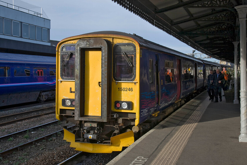 150246, GW 11.20 Cheltenham-Swindon (2B92), Gloucester station 
 As part of our split ticketing arrangements, Andy and I had to alight from the Cross Country at service (next stop Gloucester) to transfer to the following FGW service to, guess where - Gloucester! The 11.20 Cheltenham to Swindon 2B92 train is seen with us having arrived at Gloucester with an HST standing on platform one. 
 Keywords: 150246 11.20 Cheltenham-Swindon 2B92 Gloucester station First Great Western