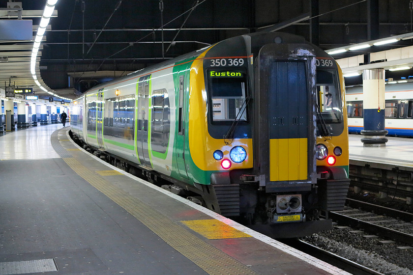 350369, LN 15.49 London Euston-Birmingham New Street (1W19, 2L), London Euston station 
 350369 sits at platform seven of Euston station having just arrived from the north. Soon, it will return as the 15.49 to Birmingham New Street. This is the train that my wife, son and I would take home to Northampton. 
 Keywords: 350369 15.49 London Euston-Birmingham New Street 1W19 London Euston station