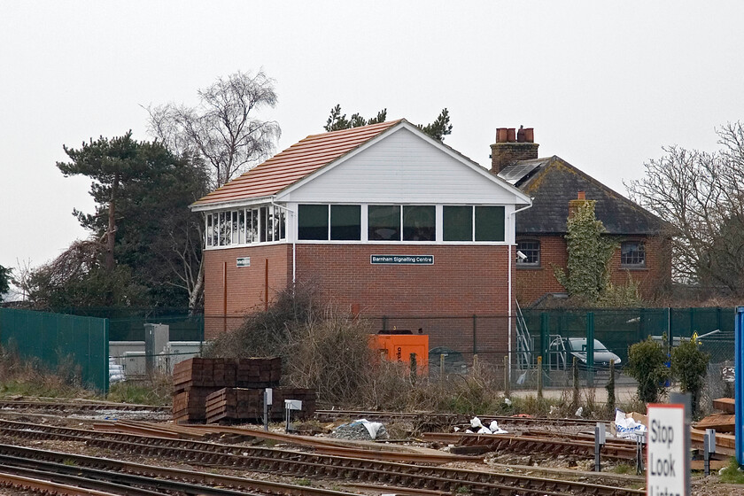 Barnham signal box (NR, 2008) 
 I hesitate to refer to the building seen in this photograph as a 'signal box'! However, at least Network Rail has made the effort to make it a familiar design rather like other recent new builds at Allington West Junction (Nottinghamshire) and Low Row (Tyne Valley). Barham opened in 2008 replacing a super platform located 1911 LBSCR box that has now been moved to the nearby Aldingbourne playing fields where it is now in use again as a community centre. 
 Keywords: Barnham signal box NR 2008