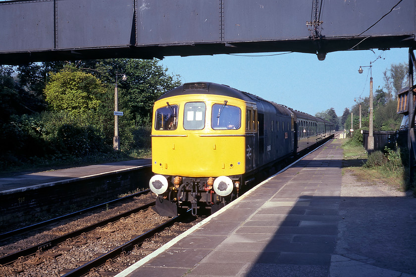 33008, 06.53 Bristol Temple Meads-Portsmouth Harbour, Bradford-on-Avon station 
 Still looking very smart following its eponymous naming just over a month previously 33008 'Eastleigh' arrives at a bright and sunny Bradford-on-Avon. It was named in commemoration of it being one of the Class 33s that hauled Lord Mountbatten's funeral train on 05.09.79 from Waterloo to Romsey. Mr. Brush and I took this train, the delayed 06.53 Bristol to Porstmouth Harbour, as far as Westbury. 
 Keywords: 33008 06.53 Bristol Temple Meads-Portsmouth Harbour Bradford-on-Avon station Eastleigh