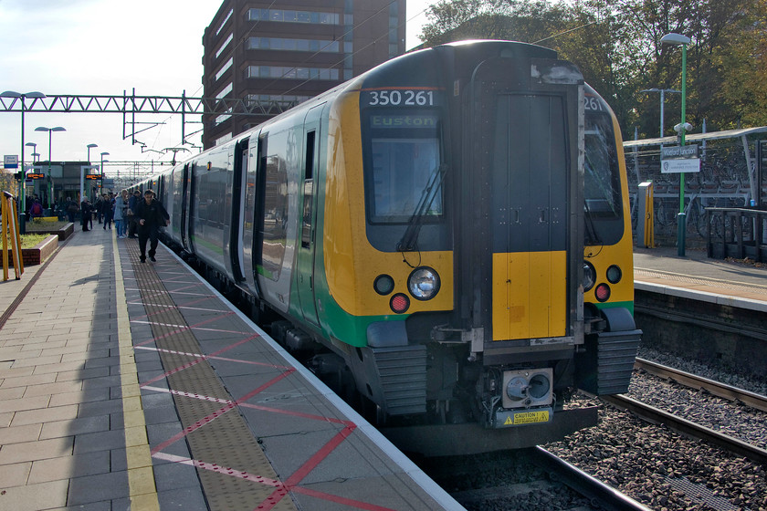 350261, LN 08.33 Birmingham New Street-London Euston (1W06, 16L), Watford Junction station 
 Having arrived at Watford Junction late and in a very crowded 350261 my wife and I were relieved to alight! The 08.33 Birmingham to Euston was very late into Northampton with 'staff shortages' cited as the alleged cause. I am never quite sure if we are being told the whole story when delays are encountered, with somebody in control just picking randomly from a menu of 'excuses' that follow the nice lady saying those words...' we are sorry to announce that....' Perhaps I'm a cynic but I do so want to support the railways but when things go wrong they often do so in spectacular fashion and are then badly handled. 
 Keywords: 350261 08.33 Birmingham New Street-London Euston 1W06 Watford Junction station