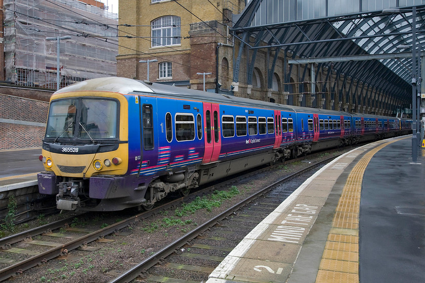 365528, FC 08.38 London King's Cross-Cambridge (1C46), London King's Cross station 
 A pair of First Capital Connect Networker Express units sit at King's Cross' platform two. The units will work the 08.38 to Cambridge running as 1C46. First Group has operated these (and many other) commuter services since 2006 but their franchise expires later this year in September. I am sure that there will be stiff competition to run these services so it will be interesting to see if they will keep the franchise. 
 Keywords: 365528 08.38 London King's Cross-Cambridge 1C46 London King's Cross station FCC First Capital Connect Networker Express