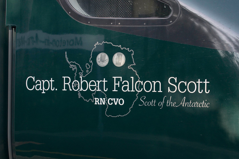 Name, 802011, GW 06.42 Hereford-London Paddington (1P18, 1E), Moreton-in-Marsh station 
 Great Western has named a small number of the class 800s and the 802s. However, it is disappointing that, in common with other operators, Virgin to name one, they are being named using fancy vinyls rather than traditional cast plates. I think that this is a retrograde step, the classic plates have always been a traditional part of the UK's railway and represent another example of its dumbing down. 802011 'Capt. Robert Falcon Scott RN CVO' stops at Moreton-in-Marsh with the 06.42 Herford to Paddington. 
 Keywords: Name 802011 06.42 Hereford-London Paddington 1P18 Moreton-in-Marsh station