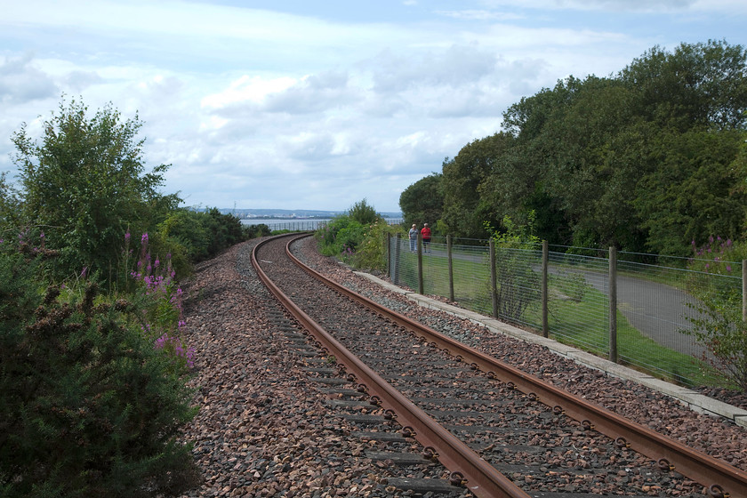 Charlestown Junction to Longannet power station line, Culross NS993860 
 We decided to take the scenic coastal drive along the north coast of the Firth of Forth rather than racing along the A585 between Dumfermline and the Kincardine bridge. This involved us closely following the mothballed line that used to allow trains to access the closed Langannet power station. Here, just east of the lovely village of Culross, the tracks are a little rusty but the weedkiller train must have traversed as the ballast is clear. 
 Keywords: Charlestown Junction to Longannet power station line Culross NS993860