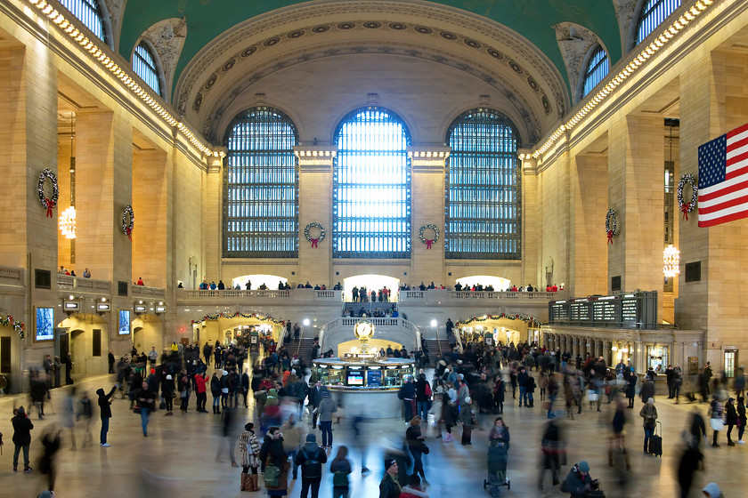 Upper concourse, New York Grand Central station 
 A general view of the Grand Central upper concourse. Opened in 1913 on a site that replaced two previous stations, the main building here at street level features an impressive elliptical barrel-vaulted ceiling. The whole structure has undergone an extensive refurbishment and it now looks absolutely superb. It was a busy place as can be seen in this image, with many people bustling around. 
 Keywords: Upper concourse New York Grand Central station